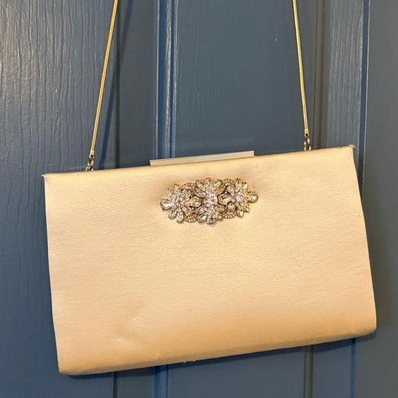 Badgley Mischka Handbags - Badgley Mischka Cream Clutch with Gold Embellishment